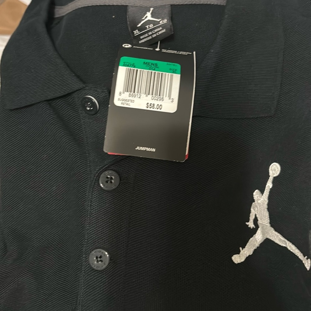 Jordan jump man embroidered polo. 23 embroided on the side sleeve.